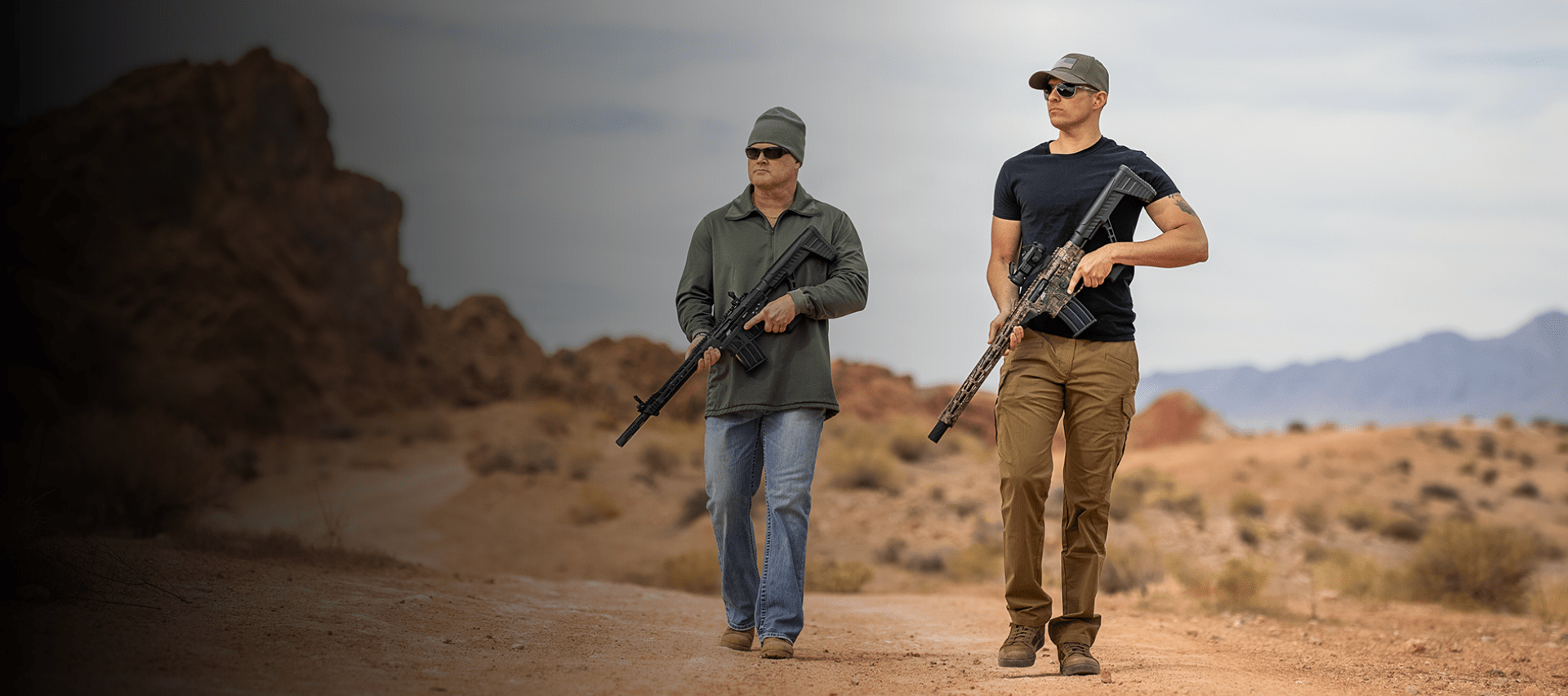 Men holding VR82 in desert